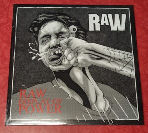 RAW-Cover-Display of Power
